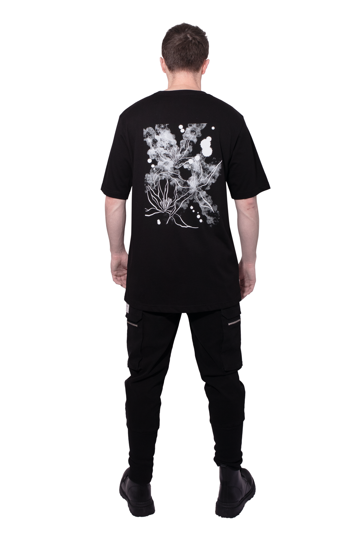 Black t-shirt with an abstract white floral design on the back